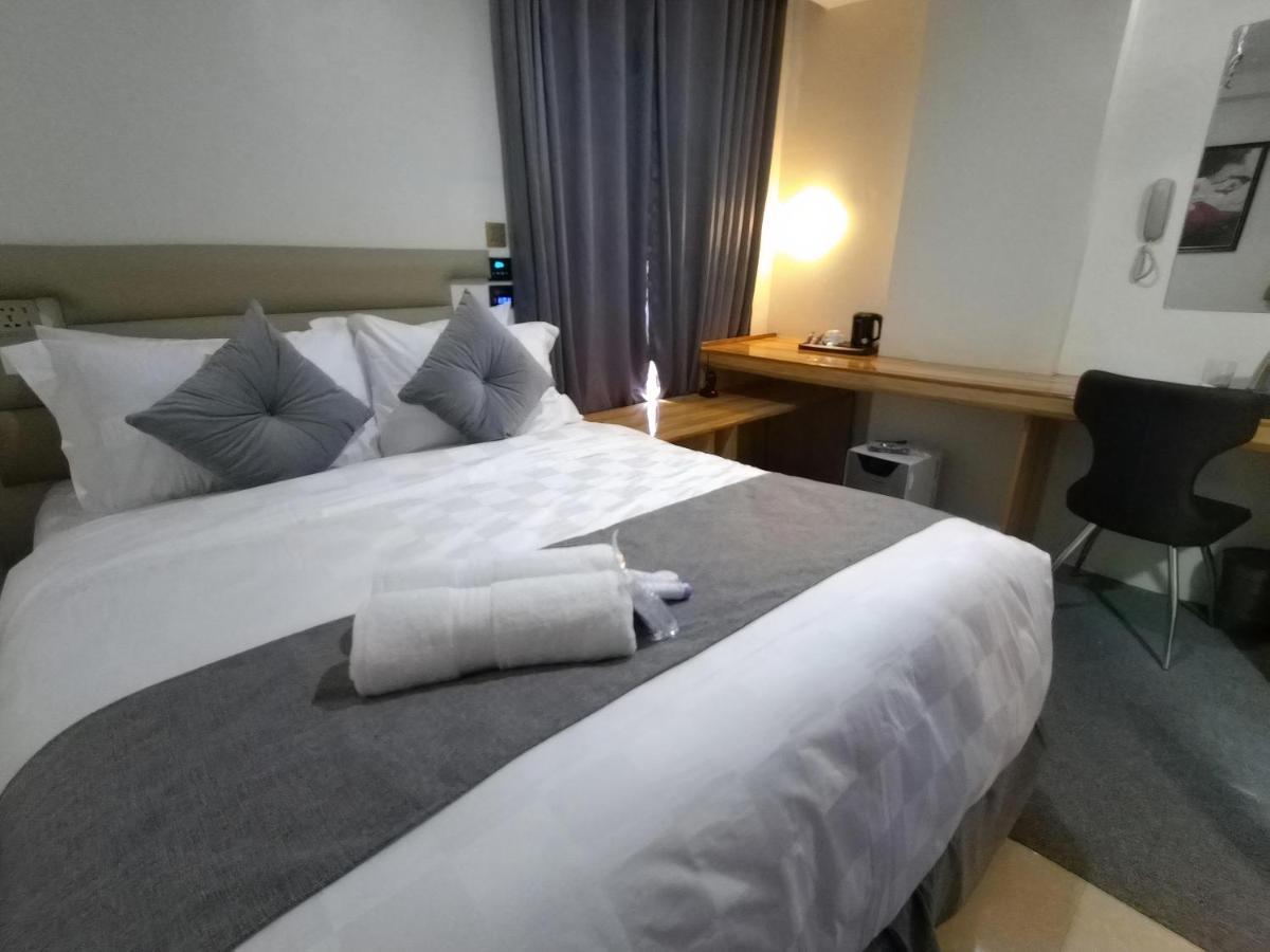 Sempre Premier Inn - Mactan Airport Hotel Lapu-Lapu City Bagian luar foto